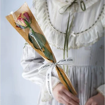 50db Kreatív újság nátronpapír Egyvirágos táskák Barna átlátszó OPP táska Virágok csomagolása Ajándék virág csomagolópapír