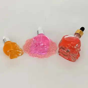 15/30/50ml színes, átlátszó koponya alakú üveg cseppentő palack illóolajhoz E-juice fejüveg folyékony kozmetikai cseppentő