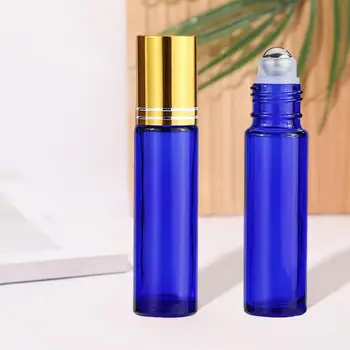 Parfümadagoló újratölthető üveghengeres palackok rozsdamentes acél golyókkal illóolajokhoz Parfüm Utazásbarát