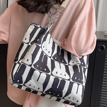 Sokoldalú táska nőknek Luxus designer kézitáskák és pénztárca 2023 Új vászon rajzfilm avatar nyomtatás színes kontraszt Mdeium