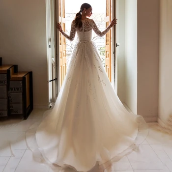 2021 Hosszú ujjú gombóc nyak illúzió rátétes csipke hátlap Organza A-Line csipke Vestidos de novia esküvői ruha